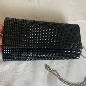 Black Shiny Purse Shoulder Bag. silver strap. 9 X 4 inch. front flap closure